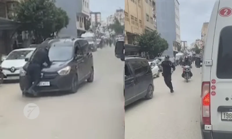 شرطي يتشبث بكابو سيارة هاربة في طنجة!